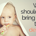 baby with blanket and toothbrush, with the words When should you bring baby to the dentist?